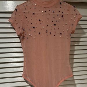 Mesh bodysuit in great condition. Wore once very stretchy
